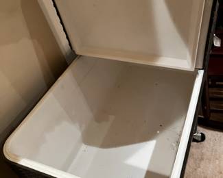#18	plastic wicker ice chest on wheels and legs with 2-sided lift 31x16x33	 $75.00 			
