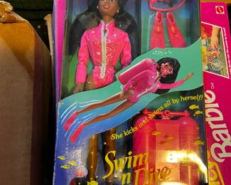 #261	Barbie swim and dive African American barbie 	 $20.00 			
