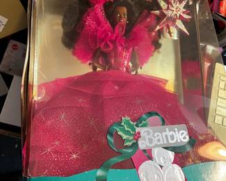 #204	barbie Holiday 1990 African American 	 $20.00 			

