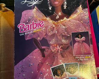 #253	barbie twinkle light she really lights up African American 	 $25.00 			
