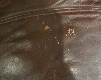 #24	double recliner brown leather sofa as is lift of recliner 74 wide	as is arm  $275.00 			
