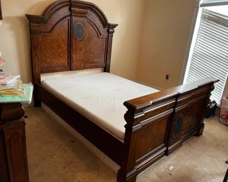 #1	queen Ashley high back bed frame with foot board leather design on back 	 $200.00 			
