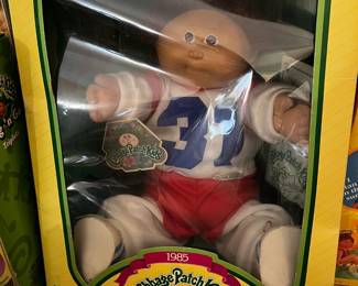 #295	cabbage patch doll 1985 football uniform doll #37	 $50.00 			
