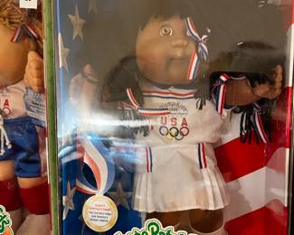 #297 	cabbage patch doll Olymikids African American	 $40.00 			
