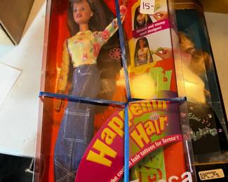 #202	barbie Happening hair blonde barbie and brunette Teresa dolls	 $30.00 			
