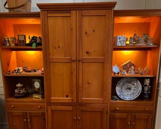 lovely three piece, lighted entertainment center