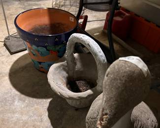 yard items, concrete and Mexican pottery