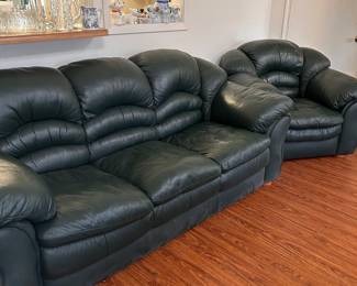 forest green leather couch and chair