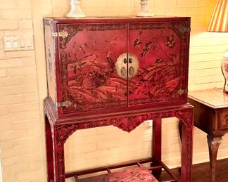 Asian carved lacquer cabinet on stand 