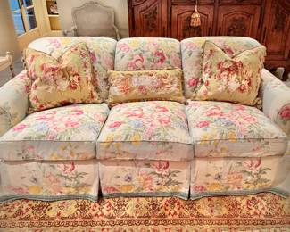Custom upholstered down sofa, one of pair, Aubusson pillows