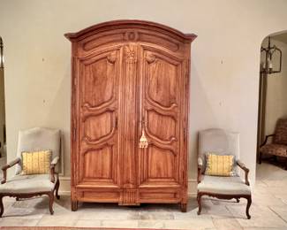 Louis XIV walnut armoire with inlaid marquetry star crest 
