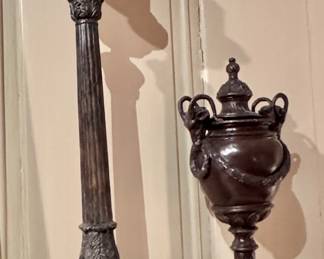 Bronze picket candlesticks and pair of covered urns 