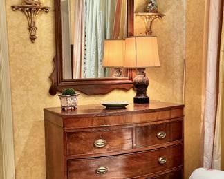 Georgian bow front chest and gilt shell carved mirror