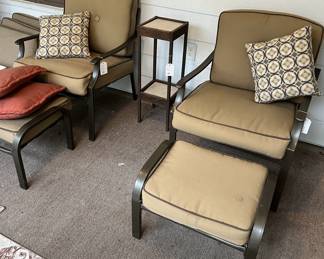 brown patio armchairs with stools