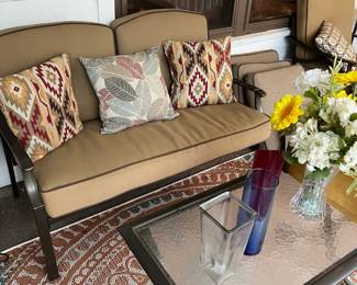 brown patio love seat, patio glass top coffee table