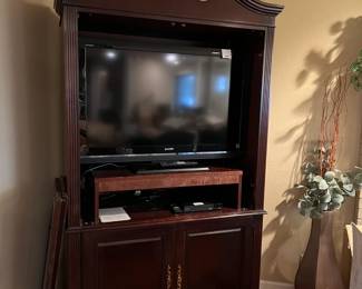 Split pediment entertainment center