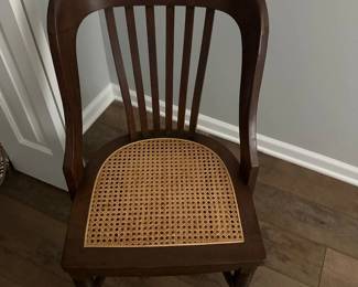 antique cain chair with curved back. In excellent condition.