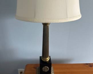 Solid brass and black lamp.