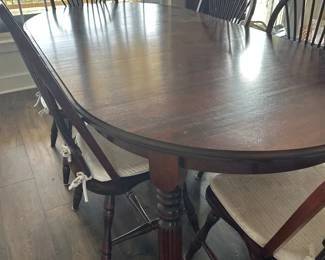 6 chair cherry dining table with an additional leaf