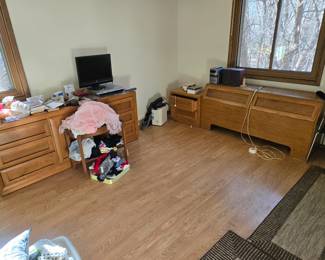 Mid-century modern bedroom set with dresser, headboard, and tall dresser in next photo