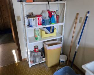 Metal shelf and everything on it.