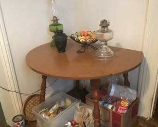 1970s drop leaf table and various totes of misc 