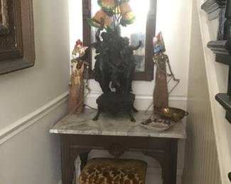 Another Marble table , Victorian style Lamp, Piano Stool, two more Indonesian Stick puppets 