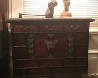 One of two Asian Chests with brass trim