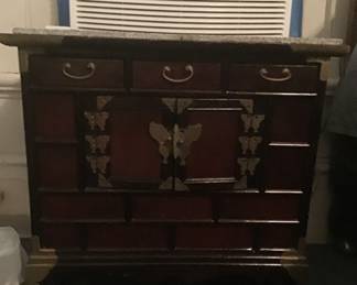 One of two Asian Chests with brass trim