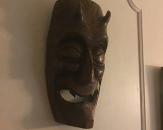 One of several wooden masks