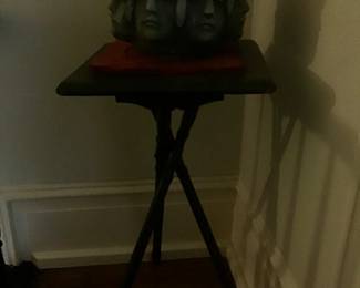 Another stand with unusual face pot 