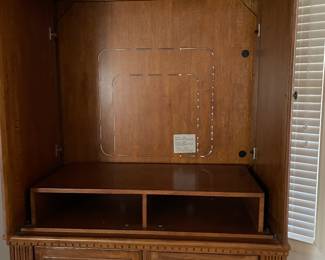 inside of armoire - put shelves in & put in your closet