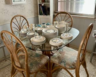 love this smaller size rattan dining table and four chairs