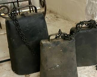 large set of cowbells cast iron