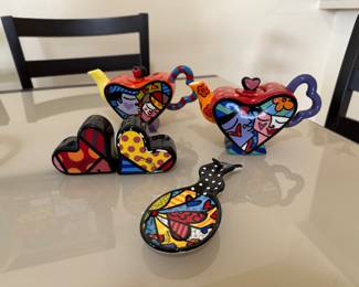 The heart salt/pepper shakers, the spoon rest=, and the teapot on the left are sold.
