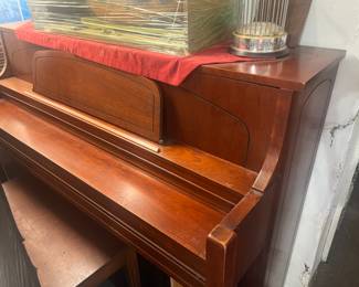 The piano is off premises, but available to be seen immediately.