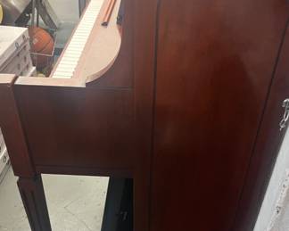 The piano is off premises, but available to be seen immediately.