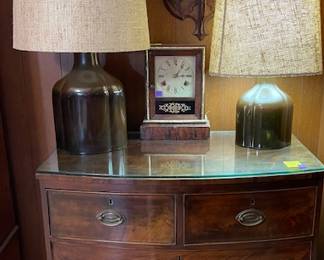 This is a stunning piece!  4 drawers, great condition, glass top.  The lamps are matching style different sized.  And another great vintage clock.