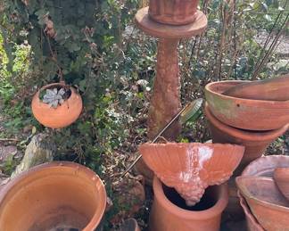 More pots and yard art, display stands and more