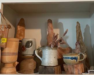 pottery and wooden items - along with small cypress knees hiding in the back