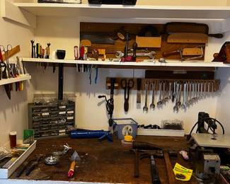 Lots of tools - this is actually a great little closet, I wish I had one in my garage.  "Oh, honey, I have a project for you..." is what I want to tell my husband.