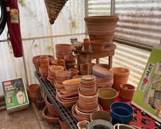 Pots galore - in the greenhouse and in the yard.  Pots of ALL sizes await you. Plenty to help you get ready for the upcoming spring and summer seasons.