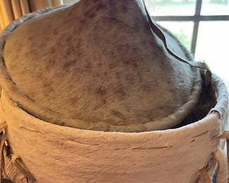 Up close image of the hide covered basket and lid - great piece