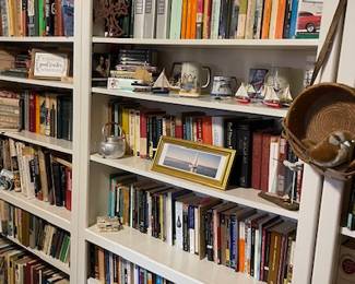 Moore books and collectibles.  These white shelving units are also available