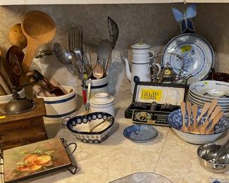 Various kitchen utensils, and blue and white items