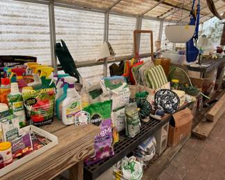 more gardening items - a packed greenhouse full.  The Greenhouse is also for sale (requires dismantling.  And while working in this green house during our most recent freeze, we can honestly say - this green house was warm and cozy