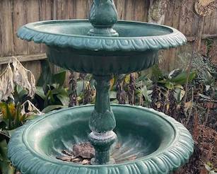 Every yard needs this - a Cast Iron water fountain.  This fountain was relocated from a local hospital that had closed down and placed in this back garden.  It was a stunning piece and offered much joy in its day.  The recent winter freeze got the best of the plant material around this fabulous piece!