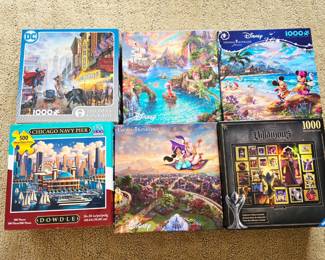 Thomas Kinkade Disney & Superman puzzles