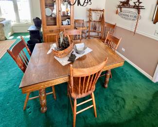 Antique Oak kitchen table w/7 leaves and 5 chairs  