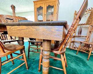 Antique Oak kitchen table w/7 leaves and 5 chairs  